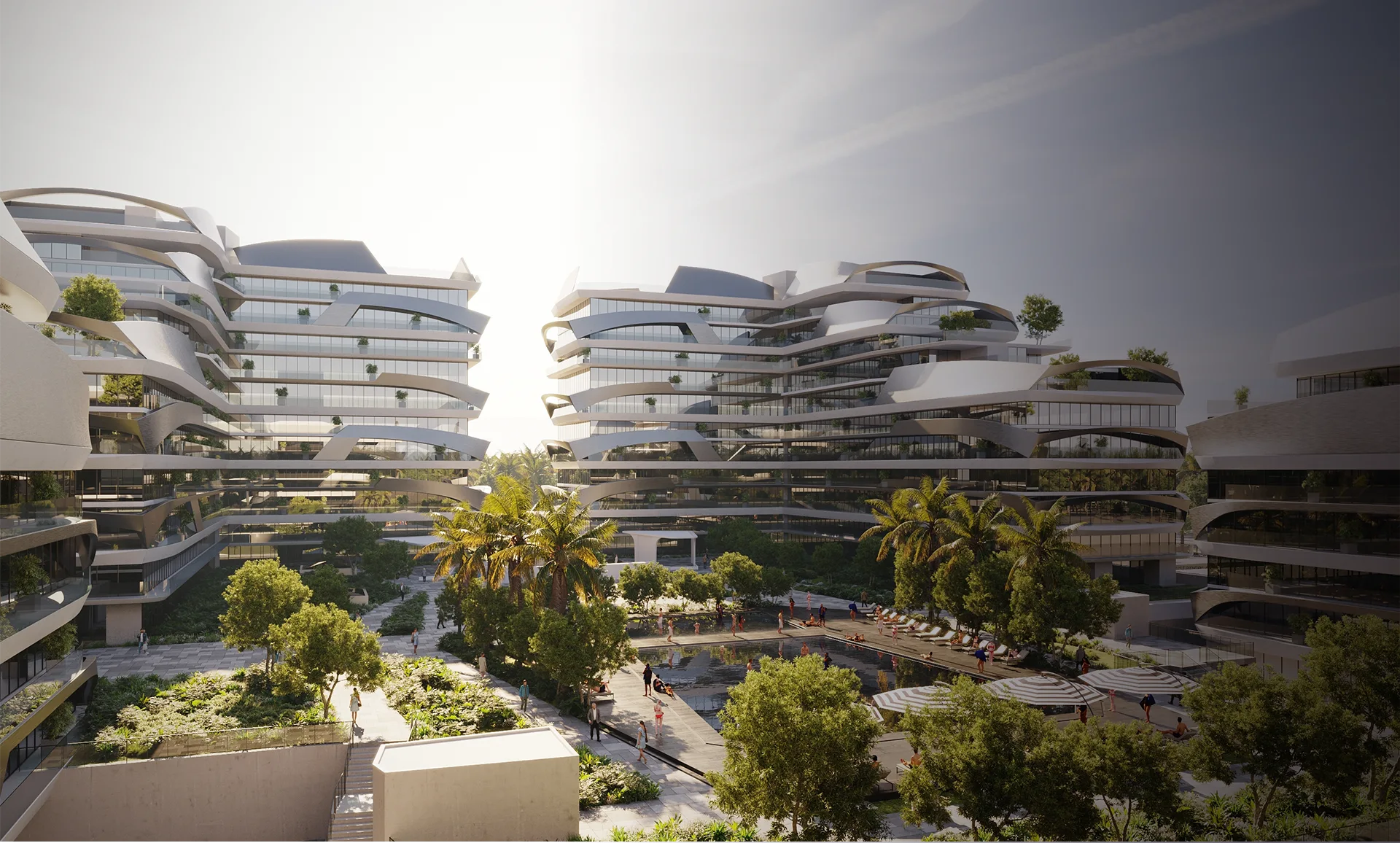 Luxury residential towers of Signature Global Tonino Lamborghini Residences in Sector 71 Gurgaon featuring futuristic curved glass architecture, landscaped gardens, and reflecting pool.